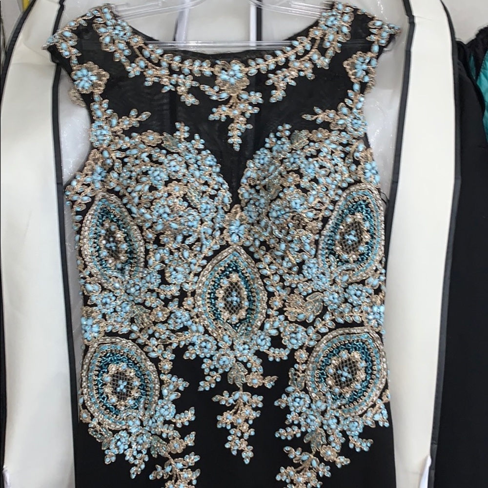 Stunning beaded floor length gown